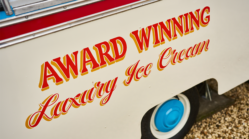 Close up of some of the detail on Bertie the ice cream van with text saying 'Award winning luxury ice cream'